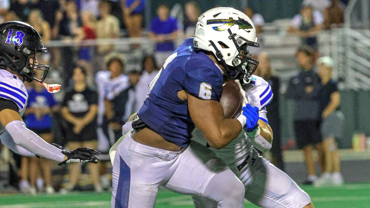 Keller running back David Makia (6) picks up yardage against Trophy Club Byron Nelson on Thursday, October 8, 2026 at Keller ISD Stadium in Keller, Texas.